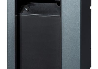 Black and gray industrial front cover panel with a recessed top opening and a power button on the front. The piece is rectangular with thick side edges and mounting cutouts on the right.