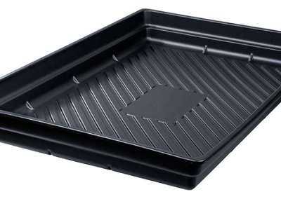 A black rectangular industrial tray with raised edges and a ridged interior bottom featuring a sloped surface designed for liquid drainage and containment, shown at an angle.