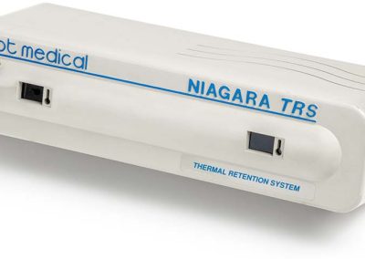 White Cabot Medical Niagara TRS thermal retention system unit shown from the front. It has a power switch and two small control openings.